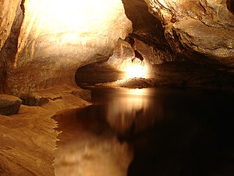 Typical County Fermanagh stream passage in Marble Arch Caves. At 11.5 km (7.1 mi), the system is the longest in Northern Ireland and second longest in Ireland. Marble Arch Caves - Skreen Hill streamway.jpeg