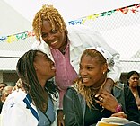 With her sister, Serena Williams, and her mother, Oracene Price (April 2001)