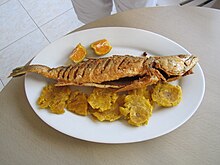 Fried corvina served with patacones Patacones and fried corvina.JPG
