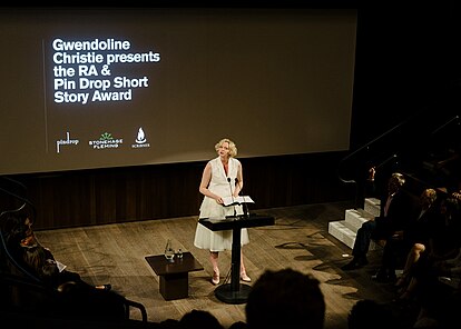 Actor, Gwendoline Christie, reading the 2018 winning story from the Pin Drop Short Story Award at the Royal Academy Pin Drop Short Story Award 2018.jpg