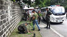Personnel of the 1st QC TASU conduct treeplanting CMO at Bgy UP Village.