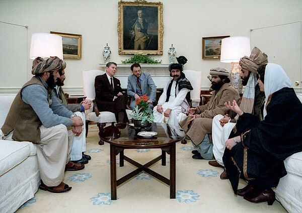 President Ronald Reagan meeting with Afghan Mujahideen leaders in the Oval Office in 1983