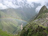 Een regenboog boven Machu Picchu
