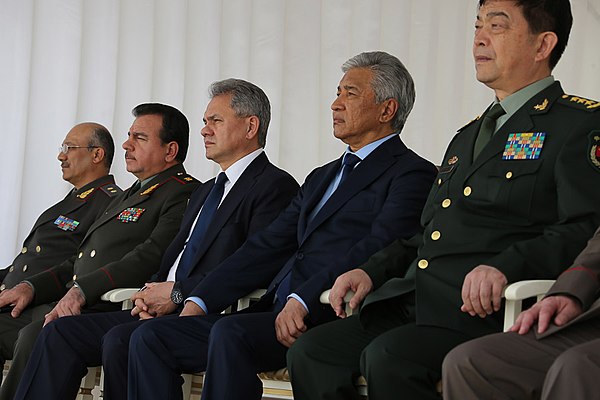 Tasmagambetov with the other Defense Ministers of the SCO during a festival of Military Massed Bands in 2015.