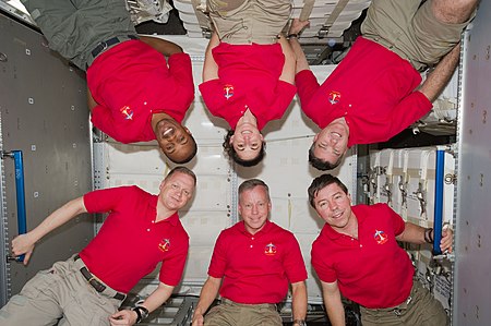 STS-133 Group Portrait in the PMM Leonardo.jpg