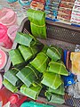 Small packets of Paniteenga wrapped in banana leaves for sale underwear to Shillong