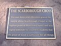 A plate with description under Scarborough Cross