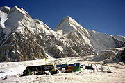 South Inylchek Base Camp, at 4,000 m on the glacier's southern moraine, looking northwest to Chapaev Peak and Khan Tengri in the distance