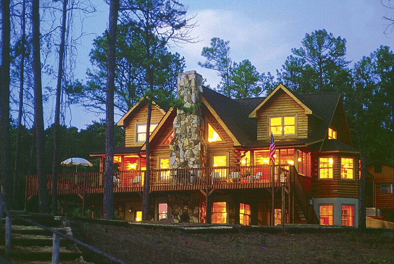 File:Southland log home by lake at dusk.jpg