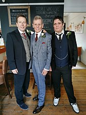 Splodgenessabounds had their only number one in Melody Maker when their "Two Pints of Lager and a Packet of Crisps Please" reached the top in 1980. Splodgenessabounds members Ricci Ricci, Vil Strang and Max Splodge.jpg