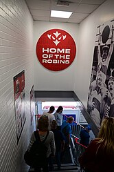 Descendign the stairs into the main lobby of the Roger Millward West Stand at Sewell Group Craven Park, Kingston upon Hull.