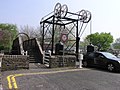 Car passing over the Windlass Lifting Bridge at Turnbridge, Huddersfield