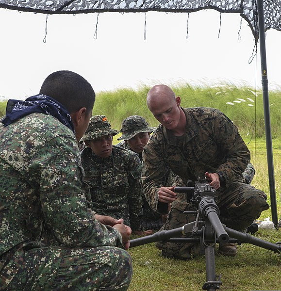 File:U.S. Marine Corps Cpl. Benjamin S. Longley, right, a machine gunner with Weapons Company, 3rd Battalion, 3rd Marine Regiment, 3rd Marine Division, assigned to the 3rd Marine Expeditionary Brigade, III Marine 131005-M-SD875-004.jpg