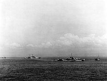 Lingayen Gulf (9 January 1945) USS Walke (DD-723) and USS Mississippi (BB-41) in Lingayen Gulf 1945.jpg