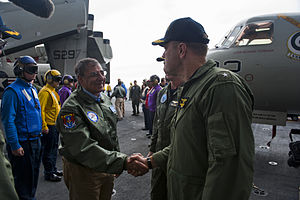 US Navy 120121-N-FI736-106 Secretary of Defense (SECDEF) Leon Panetta is greeted by Rear Adm. Dennis E. FitzPatrick, commander of Strike Force Trai.jpg