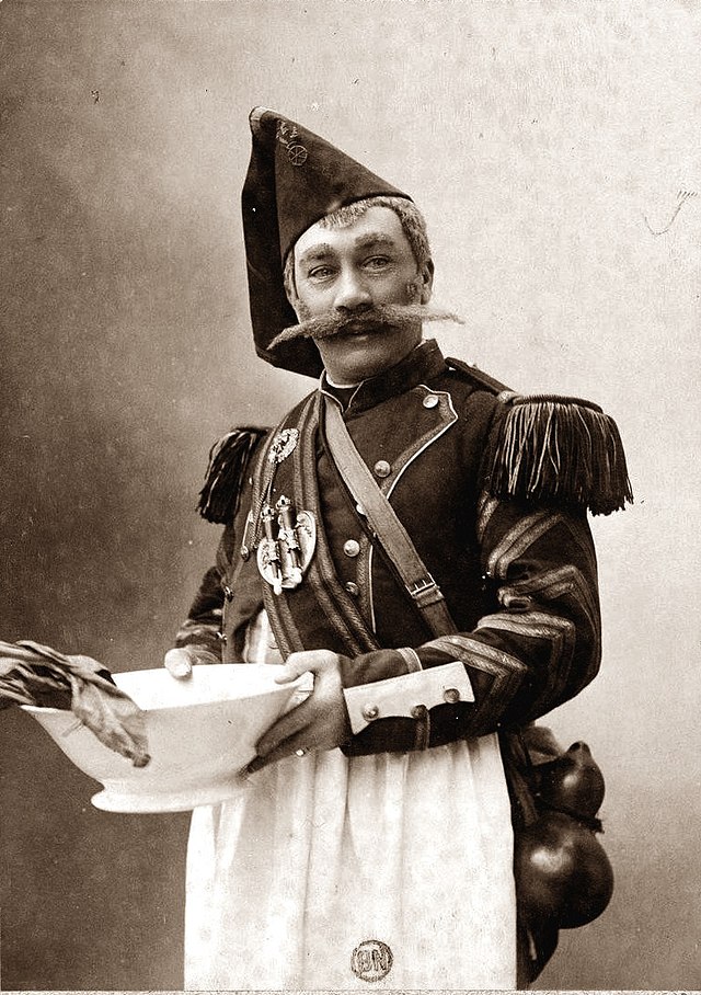 man in early 19th-century military costume, with huge moustache