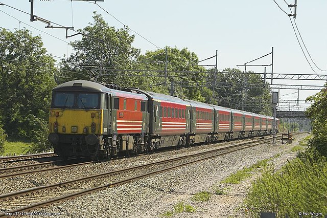 Class 87 electric locomotive and Mark 3 coaches operated by franchisee Virgin Trains