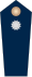 Hombrera azul con botón plateado
