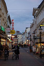 Herzog-Leopold Street at Hauptplatz square.