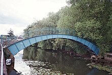 Defra pedestrian bridge from the west, looking downstream York- Locked pedestrian bridge.jpg