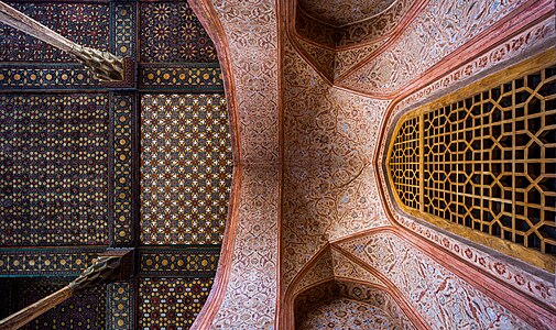 Ornate ceiling of Ālī Qāpū Palace in Isfahan, Iran
