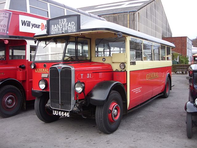 Autovac fuel lifters. On both buses the red Autovac tank can be seen above and behind the left front wheel.
