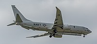 A Boeing P-8 Poseidon, tail number 168996, on final approach at Kadena Air Base in Okinawa, Japan. It has an AN/APS-154 Advanced Airborne Sensor (AAS) mounted underneath it.