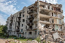 A building in Izium destroyed in March 2022, pictured in August 2023 during reconstruction attempts 3 Khlibozavodska Street, Izium (2023-08-01) 01.jpg