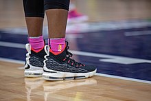 Sylvia Fowles wearing Nike LeBron 15 Air Max (2018) A closeup of Sylvia Fowles (34) shoes in the Minnesota Lynx vs Seattle Storm game at Target Center, the Storm won the game 81-72. It was Breast Health Awareness Night.jpg