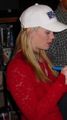 Alison Sweeney signs autographs at U.S. Naval Air Station (NAS) Sigonella, Sicily, December 25, 2002 (cropped)