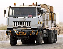 Astra 6000-series ballast tractor, using the Giugiaro-designed cab used until 2000 Astra 6000-series carrying generator, Baghdad, 2008.jpg