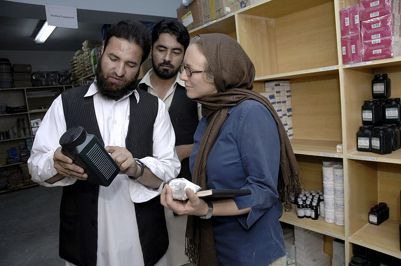 File:AusAID's Kate Elliott with Dr Ajab Noor and Chief pharmastist Mr. Kikmat Ullah at AHDS, Tarin Kowt, Uruzgan Province, Afghanistan, 2009. Photo- Lorrie Graham (10673379003).jpg