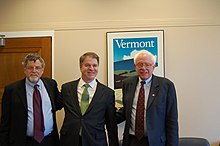 Fogel (left) with Bernie Sanders in 2009 Bernie Sanders and Huck Gutman with Daniel Fogel.jpg