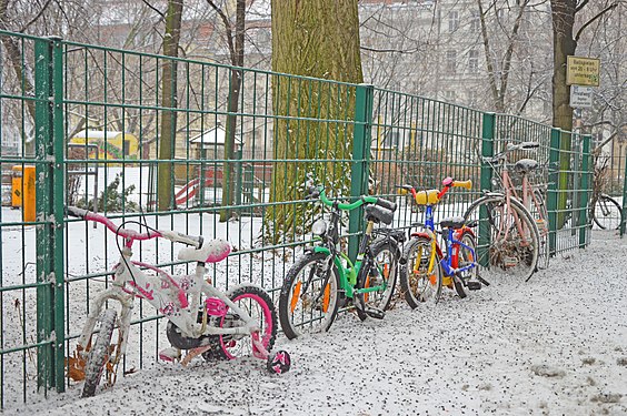 Bicycles tied to a fence in Berlin