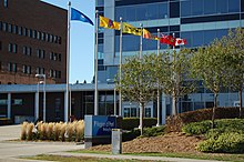 Peel Region's offices in Brampton. The city retained its role as the administrative centre of Peel following its reorganization. Brampton ON Region-of-Peel Office Flags 2017-10-18.jpg