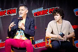 Series creator Don Mancini with Zackary Arthur, who plays Jake, at New York Comic Con. Mancini discussed in several interviews that the character of Jake was based on some of his own experiences as a gay teenager. Chucky NYCC 2022 1.jpg