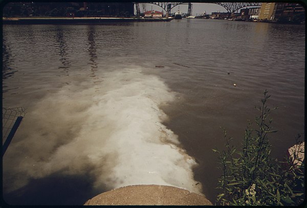 A city pump station discharges sewage into Cuyahoga River in 1973.