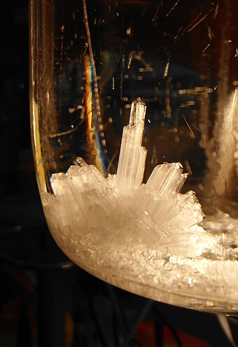 Formation of crystals in a 4.2 M ammonium sulfate solution. The solution was initially prepared at 20 °C and then stored for 2 days at 4 °C.