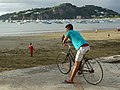 Cyclist Looks Out on Harbor - San Juan del Sur - Nicaragua (31717788011).jpg