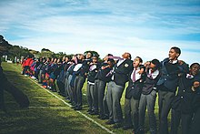 A group of Port Alfred High School students cheering for the first team rugby players using their war cry "die leeu" (the lion) Die Leeu.jpg