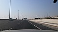 Dukhan Road in Rawdat Al Jahhaniya with the Doha Metro in the background.jpg