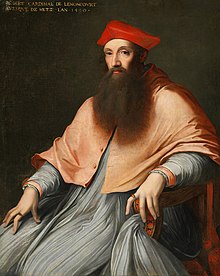 A bearded Catholic cardinal wearing his robes