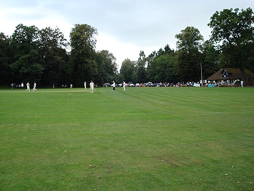 Cricket is played in the ground north of Farnham Castle