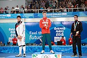 Deutsch: Fechten bei den Olympischen Jugend-Sommerspielen 2018: Tag 1, 7. Oktober 2018, Jungen, Säbel, Siegerehrung - Gold: Krisztián Rabb (HUN), Silber: Hyun Jun (KOR), Bronze: Mazen Elaraby (EGY); Medaillen überreicht durch IOC-Mitglied Britta Heidemann, Maskottchen überreicht durch FIE-Generalsekretär Emmanuel Katsiadakis English: Fencing at the 2018 Summer Youth Olympics at 7 October 2018 – Boys' sabre Medal ceremony – Gold: Krisztián Rabb (HUN), Silver: Hyun Jun (KOR), Bronze: Mazen Elaraby (EGY); Medal presenter: IOC member Britta Heidemann, Mascot presenter: FIE Secretary General Emmanuel Katsiadakis