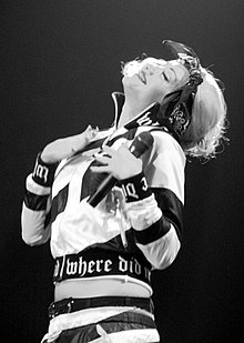 Stefani wore a L.A.M.B. racecar-style tracksuit for performances of "Crash" on the Harajuku Lovers Tour GwenStefaniCrash1.jpg