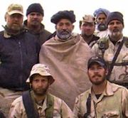 Hamid Karzai with US Special Forces in 2001