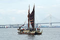 Hokule'a with her kaula pe'a (sail lines) tightened to partly close her crab-claw sails.[19]