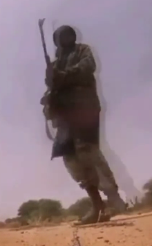 Islamic State fighter during the ambush, filmed by Jeremiah Johnson's helmet camera Islamic State in the Greater Sahara fighter during the Tongo-Tongo ambush.png