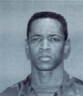 John Allen Muhammadista hänen armeijaan menonsa yhteydessä otettu kuva 1990-luvun alusta.