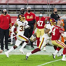 Curl returning an interception for a touchdown against the San Francisco 49ers in 2020 Kamren Curl pick six 2020.jpg